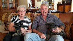Len and Lyn Nel with the schnauzer family